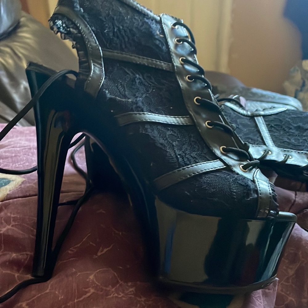 Black lace tie up platform heels. Size 8. Only worn once